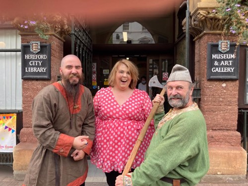 Cllr Gemma Davies and of the Black Crows reenactment group outside Hereford Museum