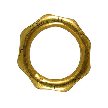Side and overhead view  - A unique gold octagonal ring dated to the 9th century with black niello rosette and flower motifs on each of the eight facets. Trewhiddle style